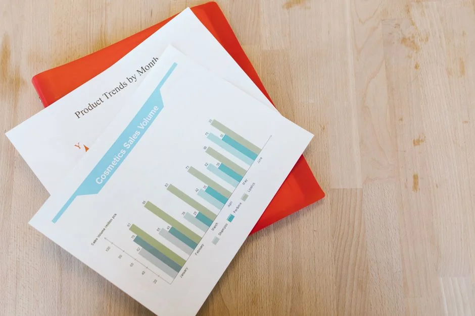 Tablet displaying an investment-related question among bitcoins and a 2021 planner. Examine crypto trends.